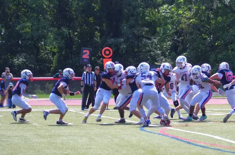 Football: Gov. Livingston Defeats Dayton, 40-27, in Opening Game