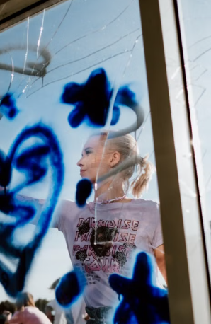 Rahway High School Students Paint UCPAC Windows for Breast Cancer Awareness Month