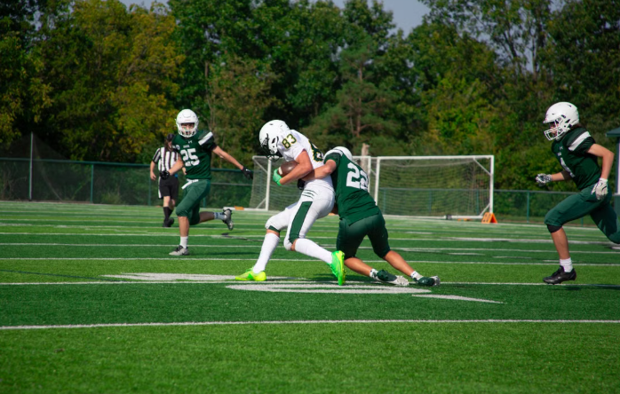 Summit Holds Off Colonia 23-21 in Season Opener
